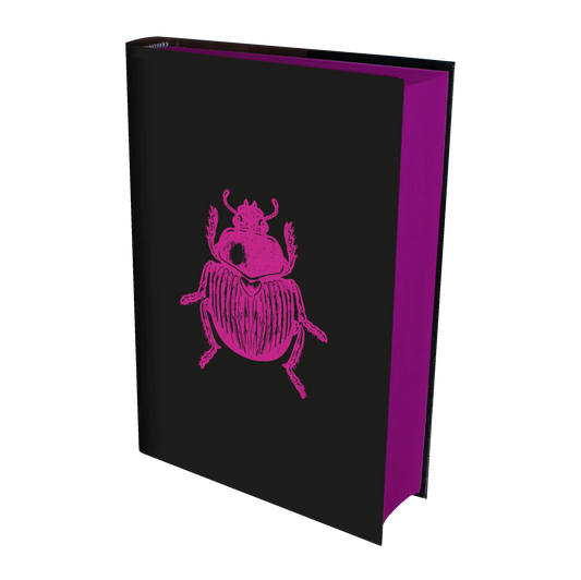 A book with a black cover and a pink illustration of a beetle.
