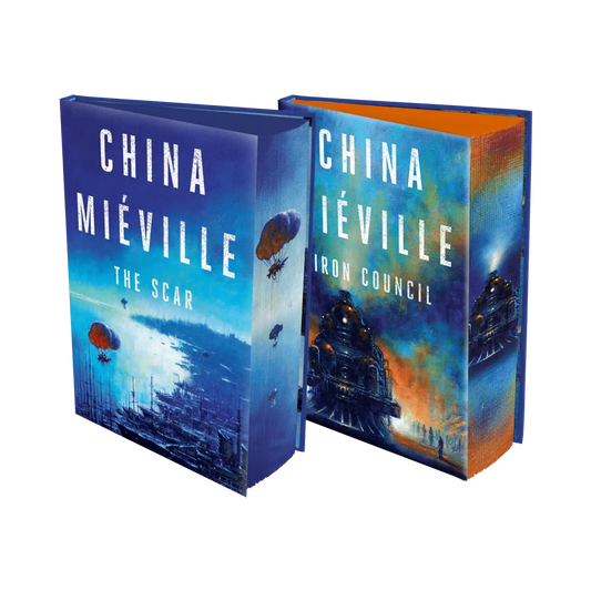 Two books by China Miéville, titled "The Scar" and "Iron Council," displayed with vibrant cover art.