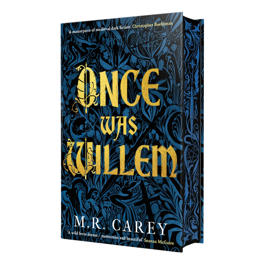 The cover of the book "Once Was Willem" by M.R. Carey, featuring ornate gold lettering on a dark blue, floral-patterned background.